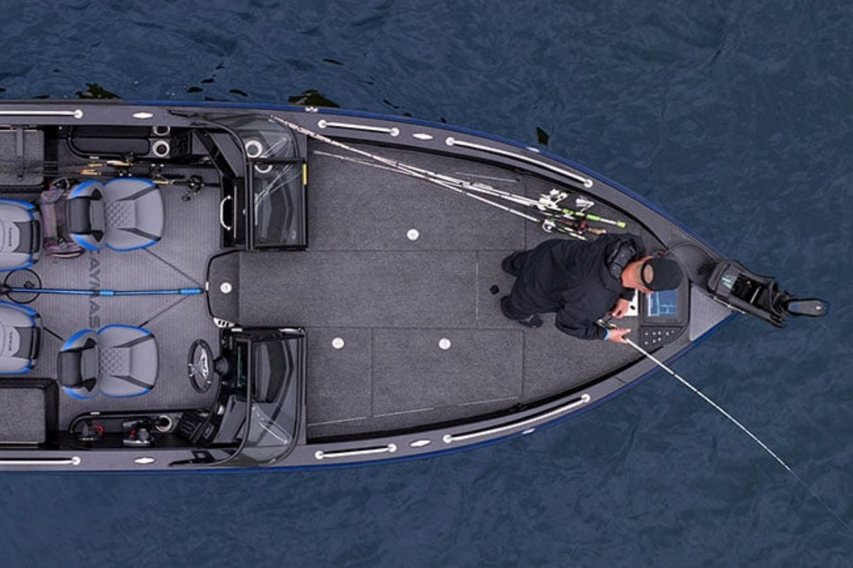 Aerial view of a boat on water running with one of the best bow mount trolling motors.