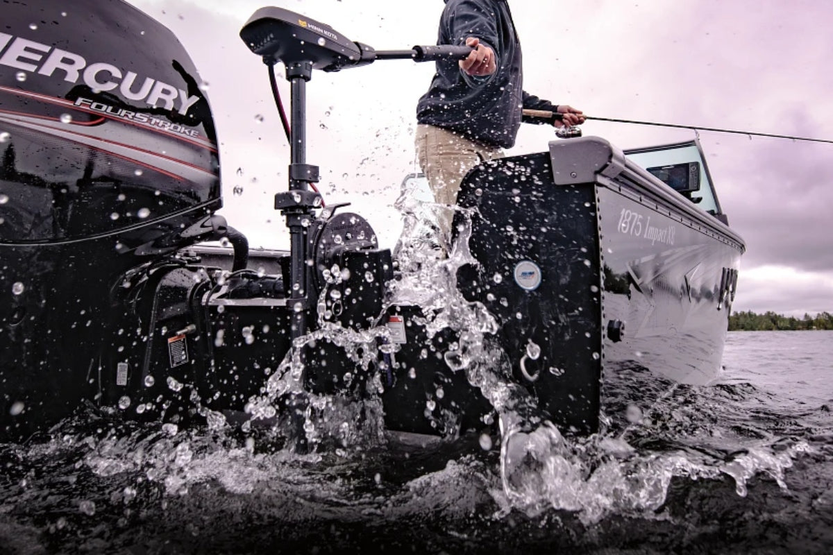Man on boat using one of the best transom mount trolling motors