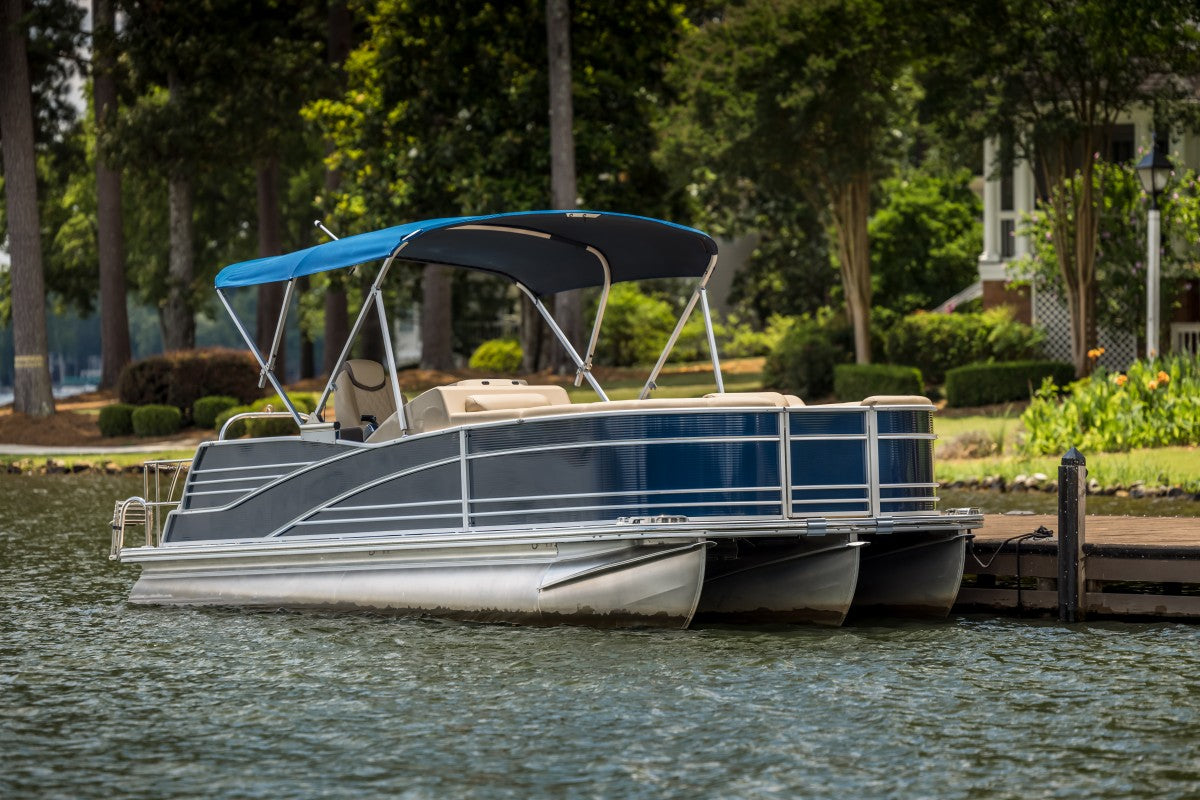 Pontoon boat on a lake, looking for the best trolling motor for a pontoon boat.
